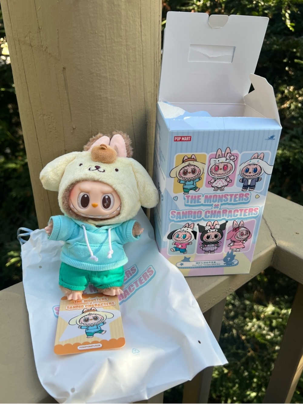 The Monsters Labubu x Sanrio Pompompurin